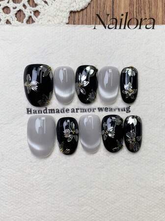 10 st handgjorda naglar ovala naglar akryl press-on naglar korta naglar, mjuka svarta naglar, silver flashiga cateye naglar, handmålade silver metallic blomma körsbärsblomma, nagelberlocker diamantinläggning, enkla eleganta lyxiga höstnaglar, höstpress-on naglar, mångsidiga naglar gör-det-själv lösnagelkonst fest dagligen och dejting användning strand tropisk semester lämplig återanvändbar, för kvinnor och flickor som present nageltillbehör