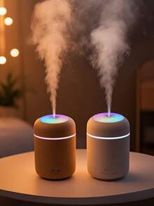 一个300毫升车载空气清新剂,室内香氛加湿器,USB供电,两种工作模式,7色LED灯,缺水智能关机,静音喷雾,方便的精油扩散器,非常适合房间装饰、办公室、客厅、汽车使用,也是送给女性的精美礼物。 - 彩色 - 查看 6