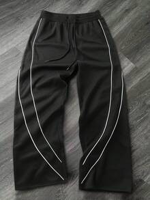 Calça esportiva masculina casual, folgada, com pernas largas e modelagem jogger. Calça de moletom masculina, calça comprida. Adequada para uso interno e externo, confortável e estilosa, presente ideal para casais. Com cintura ajustável por cordão. Presente perfeito para o Dia dos Pais. - Preto - Ver 1
