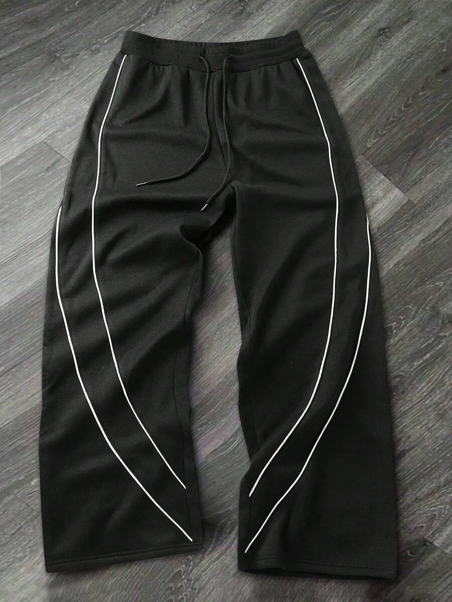 Calça esportiva masculina casual, folgada, com pernas largas e modelagem jogger. Calça de moletom masculina, calça comprida. Adequada para uso interno e externo, confortável e estilosa, presente ideal para casais. Com cintura ajustável por cordão. Presente perfeito para o Dia dos Pais. - Preto - Ver 1