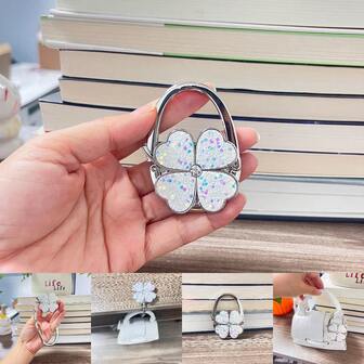 Gancho colgante plegable y portátil con diseño de trébol con diamantes de imitación, adecuado para bolsos, carteras, manualidades, un elegante y brillante colgador de carteras y accesorio de gancho de mesa, un encanto de trébol destellante para bolsos, carteras, bolsos de hombro y bolsos, gancho de viaje portátil para mesas de restaurante y escritorios, accesorio decorativo de manualidades DIY, accesorio listo para regalar para damas de honor, despedida de soltera, cumpleaños, temporada festiva y uso chic cotidiano