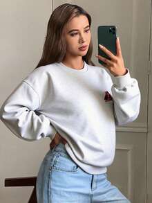 Livesso Sudadera holgada de felpa gruesa, de estilo casual y urbano, con cuello redondo, decorada con un patrón de contraste floral gris en la parte delantera, para mujer, para invierno - Gris - Ver 2