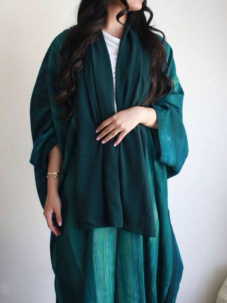 一件时尚优雅的女士开领连衣裙，深绿色，阿拉伯风格设计——适合日常穿着、派对、节日和旅行等各种场合。春季 - 墨綠色 - 查看 1