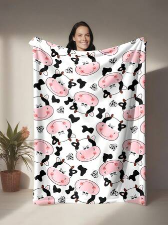 1件毛绒奶牛毯，柔软舒适，可作生日礼物，也可作床上用品，适合野餐、露营、卧室使用，是万圣节和生日礼物的理想之选，可机洗。