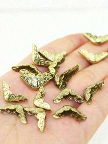 50个金色金属书角保护套——优雅保护书籍、相册和诗集。完美保护和装饰书籍，是返校学生和爱书人士的理想之选。也是打造整洁工作空间、返校学习的必备办公用品。 - 均碼 - 查看 3