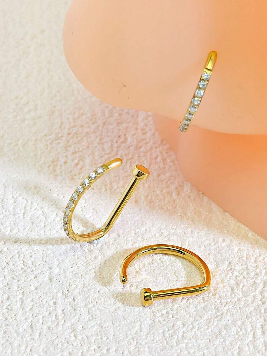 3件套/2件套/1件装女士假鼻环，金色D形镶嵌，5A级假鼻环，假唇环，鼻中隔无孔鼻夹，摇滚嘻哈不锈钢时尚朋克风身体饰品，适合女性日常佩戴、沙滩泳装、日光浴、舞会、派对、情人节、万圣节、圣诞节、母亲节、开学季、生日等场合，可作为送给女友/男友/母亲/父亲/同学的礼物。 - 金黃色 - 查看 1