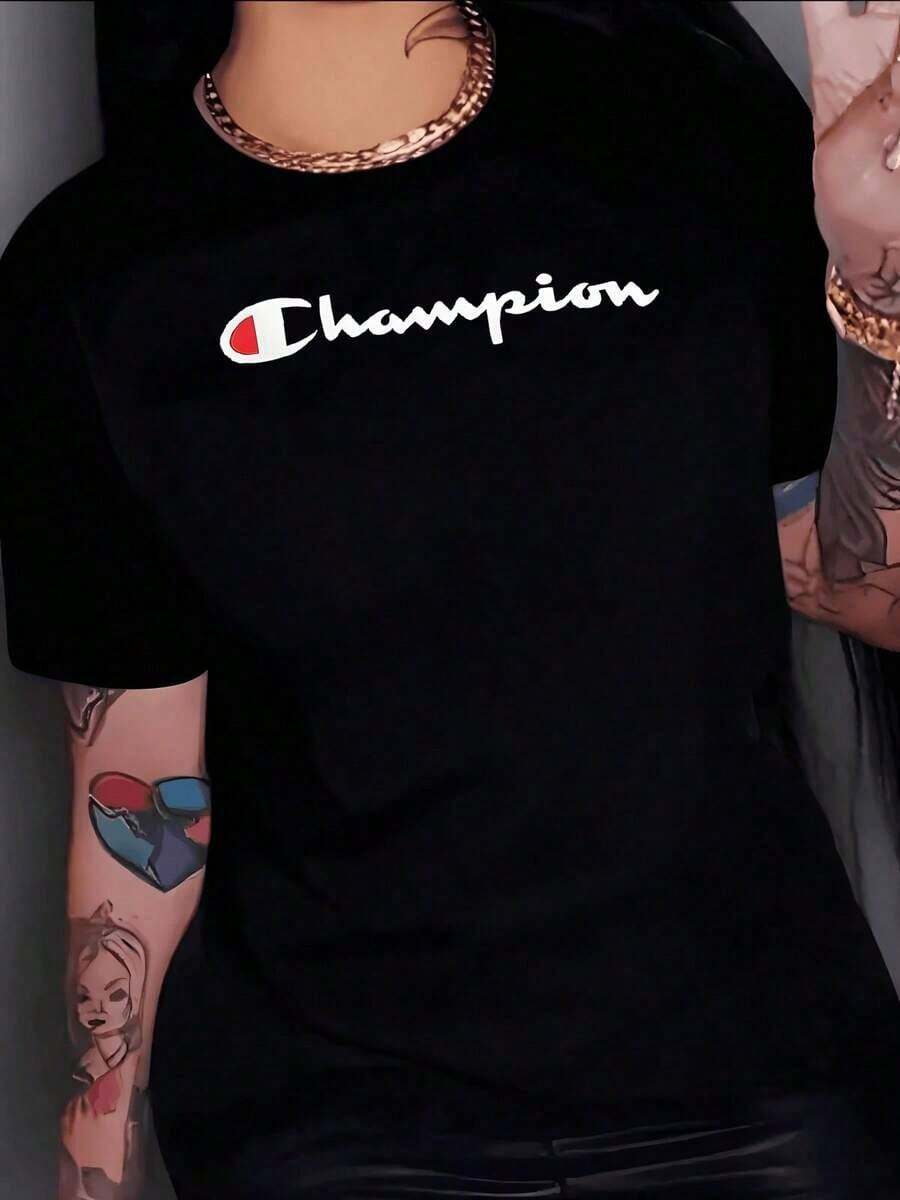 Texto con la palabra Champion en estilo energético simbolizando fuerza superación y espíritu deportivo que inspira confianza y actitud positiva camiseta de mujer 100% algodón suave cómoda para uso diario - Negro - Ver 1