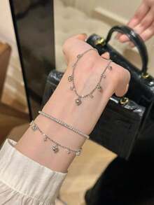 1件S925纯银心形钻石手链，女士奢华珠宝，优雅百搭，适合情人节、生日派对和日常佩戴。 - 愛心閃鑽手鍊 - 查看 5