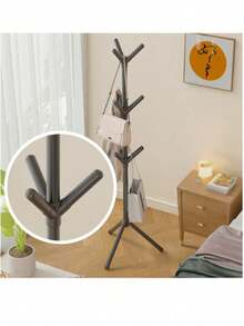 1个现代树形落地式衣帽架 - 稳固的三角形底座，塑料材质，轻巧设计，挂钩可360°旋转，节省空间，适用于玄关、卧室和客厅。北欧简约单杆卧室衣帽架，易于组装，适合家庭、办公室或酒店使用。提供黑色/白色两种颜色，可选6个或9个挂钩，多功能收纳，适合公寓生活。