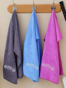 This Is A Sports Towel Made Of Microfiber Material, Available In Three Colors: Blue, Gray, And Purple.