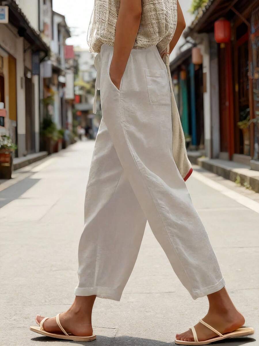 Pantalones de mujer de unicolor con cordón en la cintura y bolsillos laterales - Albaricoque - Ver 1