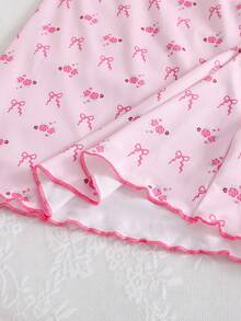 Este dulce, elegante y casual conjunto de ropa de estar en casa de manga larga está diseñado especialmente para niñas. Presenta un cuello redondo con estampado de lazos rosas y un bajo recogido, creando un estilo de princesa cómodo. Es muy adecuado para usar en casa, leer, descansar y relajarse. También es un gran regalo para niños o amigos. - Rosa - Ver 10
