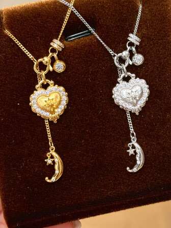 1件时尚优雅星爆心形吊坠项链，铜色水钻月亮星星吊坠项链，适合女性日常佩戴、派对、节日，可作为新年、生日礼物或珠宝礼品。