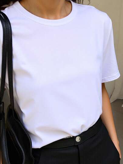 DAZY Camiseta básica de mujer de manga corta y ajuste holgado de unicolor con cuello redondo para el verano