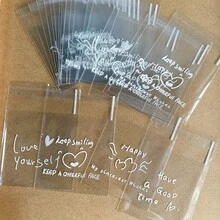 Khoảng 100 túi quà tặng tự dính hình trái tim trong suốt 4 trong 1, in hình câu nói truyền cảm hứng - Túi quà tặng bằng nhựa, thích hợp cho sinh nhật, đám cưới, ngày lễ - Túi đựng quà nhỏ tái sử dụng, túi quà tặng, túi quà tặng ngày lễ, thiết kế hình trái tim, túi tự dán. - Trong sáng - Xem 5