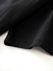 Camiseta informal de mujer, de manga corta, cuello redondo y hombros caídos, confeccionada en tejido de punto con un ligero toque elástico, ideal para el día a día. - Negro - Ver 5