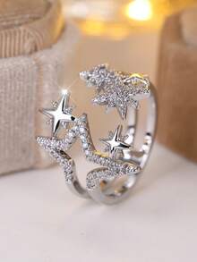 Vanel An Elegant Open Ring From The Star Collection For Women - A Stylish And Minimalist Design, Featuring A Sparkling Cubic Zirconia Stone And A Golden Yellow Open Shape, Suitable For Everyday Wear And As A Gift.