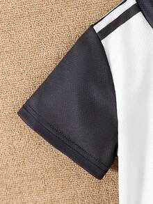 2pcs/Set Young Boy's Casual Sports Style Outfit, Black & White Contrast Color Block "SPORTS" Letter Striped Star Number "7" Graphic Round Neck Short Sleeve T-Shirt Paired With Loose Black Shorts, Football Uniform Set, Suitable For Outdoor, Back To School, Commute, Social Events, Spring/Summer