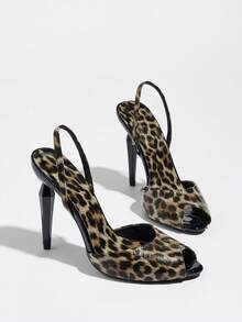 Giày sandal cao gót nữ, thời trang và thanh lịch, thích hợp cho các bữa tiệc, sự kiện ngoài trời và những dịp trang trọng. Thiết kế nổi bật với lớp phủ kim loại, mũi tròn, hở mũi, đính đá lấp lánh và quai buộc cổ chân. Màu nâu họa tiết da báo, phù hợp với mọi sự kiện trang trọng hoặc trang phục trang trọng. Thích hợp cho trang phục mùa xuân hè. - Nâu báo - Xem 5