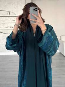 一件时尚优雅的女士开领连衣裙，深绿色，阿拉伯风格设计——适合日常穿着、派对、节日和旅行等各种场合。春季 - 墨綠色 - 查看 8