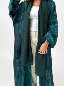 一件时尚优雅的女士开领连衣裙，深绿色，阿拉伯风格设计——适合日常穿着、派对、节日和旅行等各种场合。春季 - 墨綠色 - 查看 2