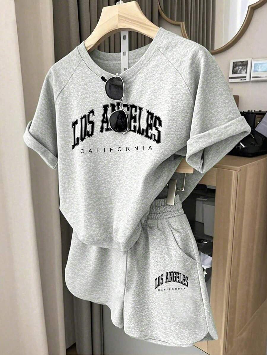 Conjunto de camiseta de manga corta con cuello redondo y estampado de dibujos animados, y pantalones cortos para niña preadolescente - Gris - Ver 1
