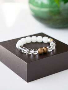VE 一条高品质天然和田白玉手链，搭配喜马拉雅白水晶和檀香木手链。白玉柔和的光泽滋养肌肤，白水晶净化负能量，提升灵性，檀香木舒缓焦虑，辅助冥想。手工编织多层设计，百搭奢华配饰，自用或送礼皆宜。天然宝石颜色略有不同。