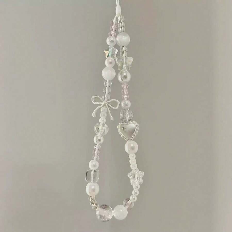 1件亚克力蝴蝶结手机挂绳，CCD相机吊坠，钥匙扣，手机壳配件 - 彩色 - 查看 1