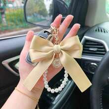 1 Beige Faux Pearl Chain Large Minimalist Fashion Bag Pendant Car Keychain Personalized Ribbon Bow Tie Pendant Suitable For Women Bag Accessories Gift Gift Accessories Decor For Teen Girls Women College Students Rookies & White-Collar Workers Car Accessories Women Key Chain Charms Wristlet Keychain Bow Keychain School Supplies Teacher Gifts Back To School Teacher Accessories Valentines - 黑色 - 查看 6