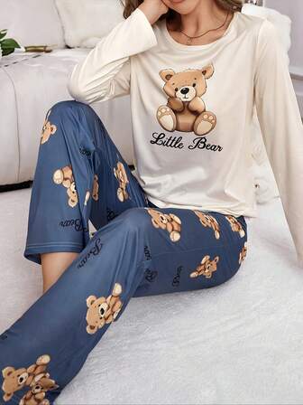 Aprikosfärgad pyjamas med lång ärm och byxor i tecknad stil för kvinnor