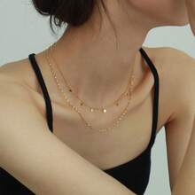 European And American Cross Necklace In Double-Layered 18K Titanium Steel With A Clavicle Chain And Tassel, Modern And Versatile For Women. - Gold - View 1
