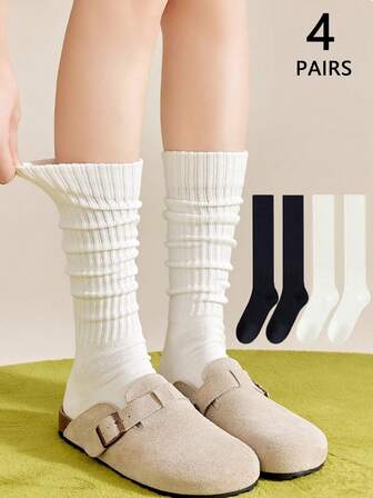4双装女士黑白简约修身中筒袜，棉质保暖长袜，适合搭配皮鞋日常穿着，四季皆宜。