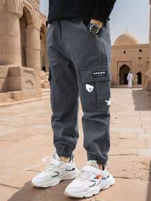 1 件青少年男孩休闲户外口袋卡通印花工装裤，春夏秋 - 灰色 - 查看 3