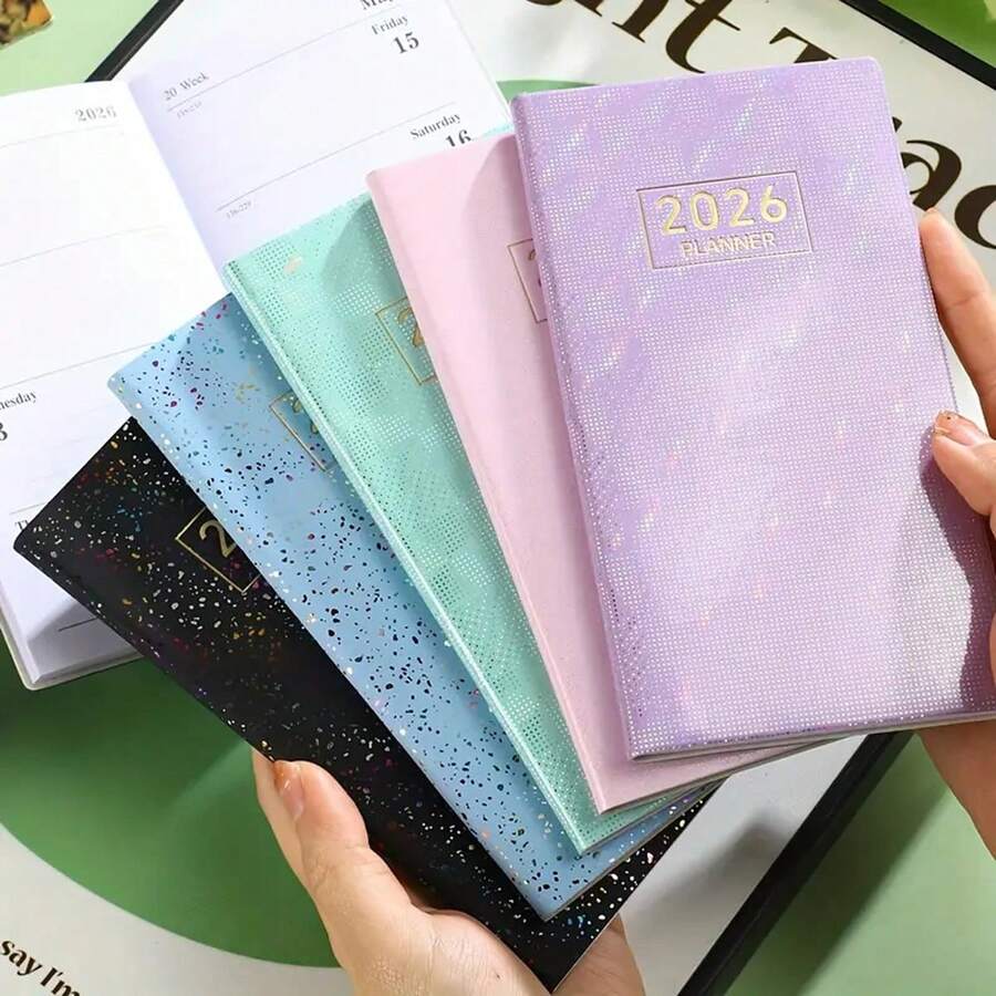 1 pieza Planificador semanal con portada de estrellas y colores A7 tamaño 2026, 64 hojas/128 páginas, calendario de cuero fino, incluye planificación anual, mensual y diaria, adecuado para regalos de vacaciones y uso diario, agenda de bolsillo portátil, ideal para regalos de Año Nuevo