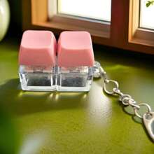 1个减压键盘钥匙扣 - 一款指尖玩具，有效缓解压力，采用亮丽的马卡龙色。外观、颜色和设计都非常吸引人，是完美的派对礼物、礼品和馈赠亲友的佳品。 - 彩色 - 查看 12