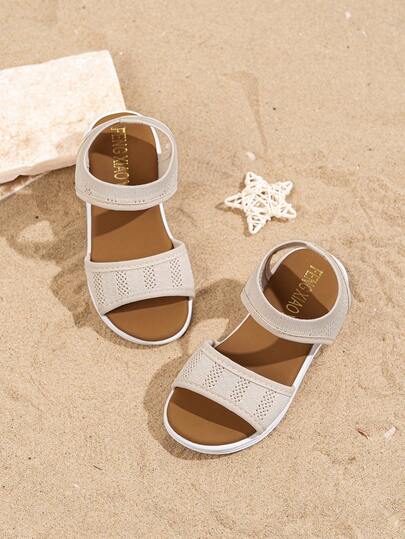 Dép xăng đan rỗng dệt kim mùa hè mới nhất 2025 dành cho trẻ em - Thiết kế màu be, thời trang thường ngày, thoải mái và tối giản. Lý tưởng cho các hoạt động hàng ngày, cuộc sống học đường, kỳ nghỉ hè, tụ họp cuối tuần và các hoạt động ở công viên, và có thể dễ dàng phối hợp với nhiều loại quần áo trẻ em.