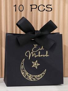 Ten Exquisite Little Eid Al-Fitr Gift Boxes, Each In Elegant Black, Luxurious Green, And Pure White, Are Adorned With Delicate Gold Star And Moon Motifs And Tied With Luxurious Gold And Silver Ribbons. Perfect For Storing Sweets, Chocolates, And Small Gifts, These Boxes Are Crafted From Premium Materials And Create Stunning Packaging For Special Occasions.