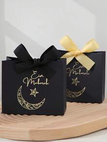 Ten Exquisite Little Eid Al-Fitr Gift Boxes, Each In Elegant Black, Luxurious Green, And Pure White, Are Adorned With Delicate Gold Star And Moon Motifs And Tied With Luxurious Gold And Silver Ribbons. Perfect For Storing Sweets, Chocolates, And Small Gifts, These Boxes Are Crafted From Premium Materials And Create Stunning Packaging For Special Occasions.