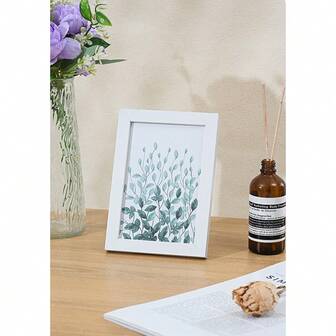 1个木质6英寸A4简约相框，可作桌面摆件或墙面悬挂，手工制作。可放置或悬挂于墙上。北欧简约风格，非常适合作为礼物。