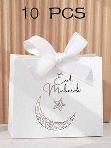 Ten Exquisite Little Eid Al-Fitr Gift Boxes, Each In Elegant Black, Luxurious Green, And Pure White, Are Adorned With Delicate Gold Star And Moon Motifs And Tied With Luxurious Gold And Silver Ribbons. Perfect For Storing Sweets, Chocolates, And Small Gifts, These Boxes Are Crafted From Premium Materials And Create Stunning Packaging For Special Occasions.