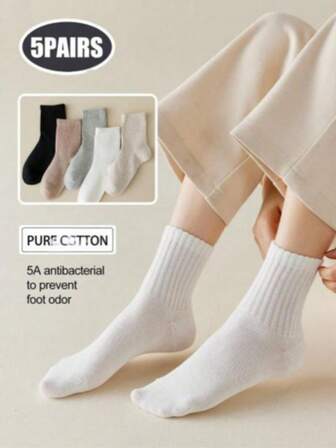5 par neutrala, medellånga strumpor i ren bomull för kvinnor, med hög elasticitet, antibakteriella och luktborttagande egenskaper. Den flerfärgade, enkla versionen passar för vardags-, fritids- och affärskläder.