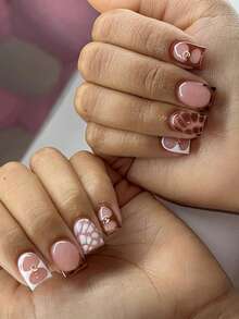 Bộ 24 miếng dán móng tay vuông ngắn họa tiết da báo dập nổi kiểu Pháp, thiết kế da báo và đá đính, thể hiện phong cách nữ tính quyến rũ, vừa vặn hoàn hảo. Bộ sản phẩm bao gồm 1 lọ sơn gel và 1 dũa móng tay, phù hợp cho phụ nữ và các cô gái sử dụng hàng ngày và trong các bữa tiệc. - Nhiều màu - Xem 7