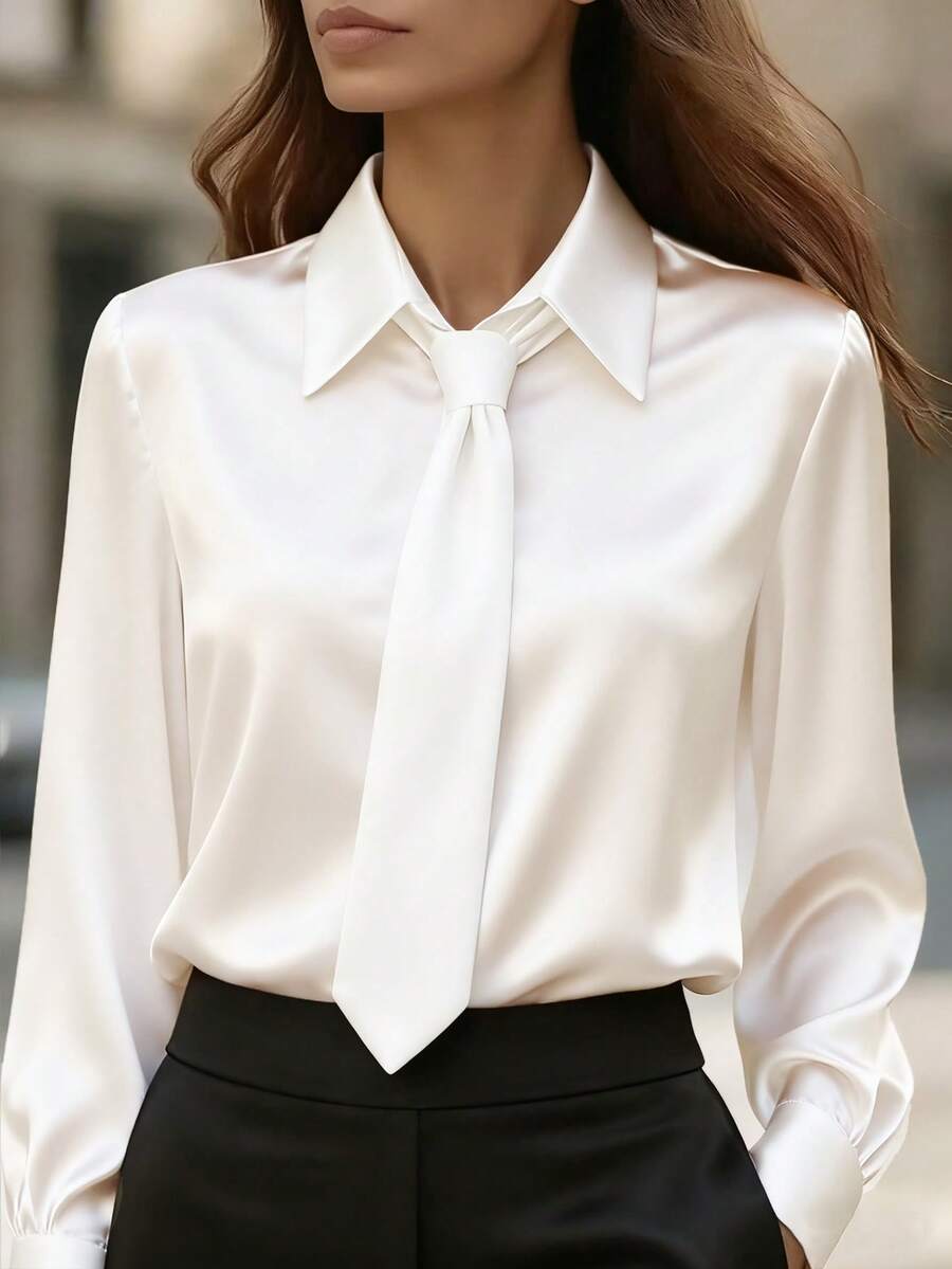 Áo sơ mi nữ thanh lịch ôm dáng, cổ buộc dây - Chất liệu satin chống nhăn, không xuyên thấu, áo công sở tay dài, dễ bảo quản (có thể giặt máy) - Thích hợp cho công việc, tiệc tùng, sự kiện xã hội, thiết kế cổ buộc dây, chất liệu mềm mại như lụa, trang phục nữ thanh lịch thường ngày cho mùa xuân, hè, thu. Màu trắng. - trắng - Xem 1