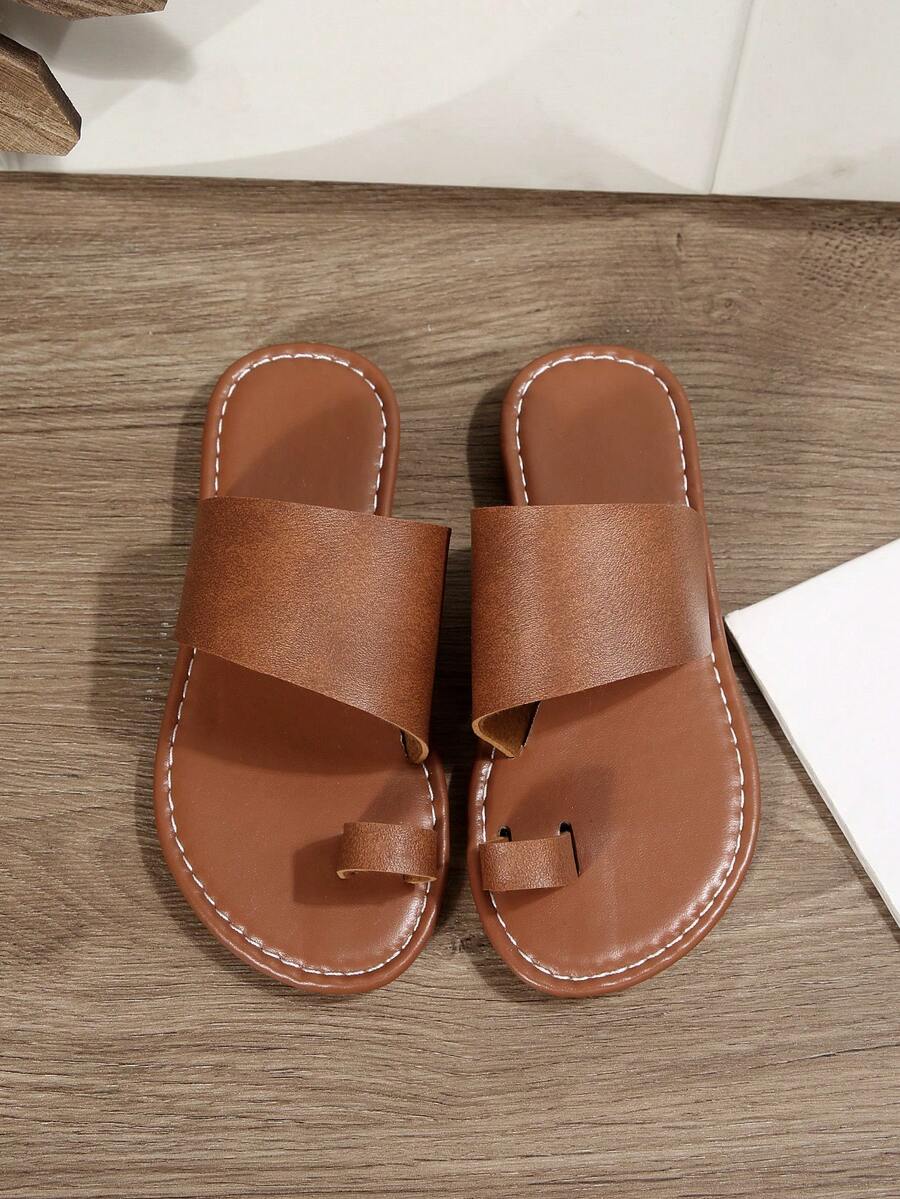 Một đôi dép xăng đan trẻ em, kiểu dáng mới mùa hè 2026, thời trang và đa năng, mũi tròn, đế bằng, chống trượt, màu đen, trắng, nâu, vàng, thích hợp mang đi biển, dép đi ngoài trời. - màu nâu - Xem 1