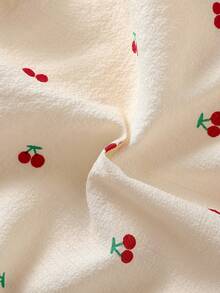 女婴休闲家居服樱桃领长袖口袋上衣和松紧腰樱桃印花裤套装，适合家居服