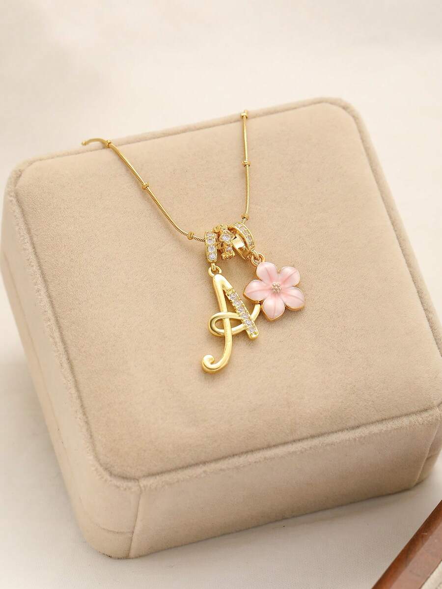 1件装奢华个性化立方氧化锆优雅手写字母粉色五瓣花金色不锈钢项链，女士简约字母名字项链，字母吊坠项链，时尚礼物，适合送给女朋友、妈妈、家人、朋友、女儿，周年纪念日、情人节、母亲节、生日、毕业典礼、日常佩戴、婚礼、舞会等场合。 - 金色 - 查看 1