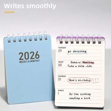 مخطط جيب، يتميز بتقويمات كاملة للعام 2026 و 2027. دفتر ملاحظات مربوط بحلزون مدمج مع تخطيطات شهرية وأسبوعية مزدوجة. مصنوع من ورق سميك مقاوم للحبر. دفتر جدول قابل لإعادة الاستخدام مناسب للعمل والمدخلات اليومية. مثالي كمخطط طالب أو مكتبي صغير. دفتر سفر ومنظم، محمول بسهولة.