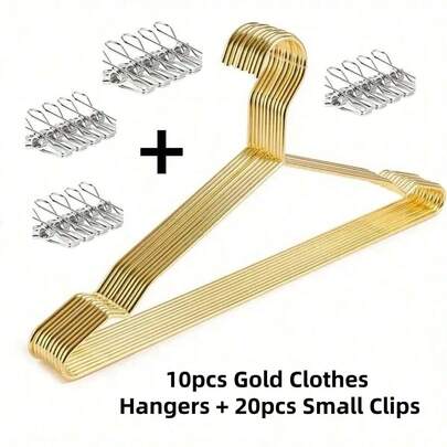 17英寸重型金色金属衣架，采用不锈钢材质，宽大的挂钩间距，非常适合悬挂外套和西装，是现代衣橱的必备收纳神器。这款衣架经久耐用，可支撑各种面料的衣物，节省空间，表面防滑，配有结实的金属挂钩，是日常使用、春季衣橱焕新和换季衣橱整理的理想之选。品质卓越，经久耐用，是家庭或精品店衣橱的多功能衣架。