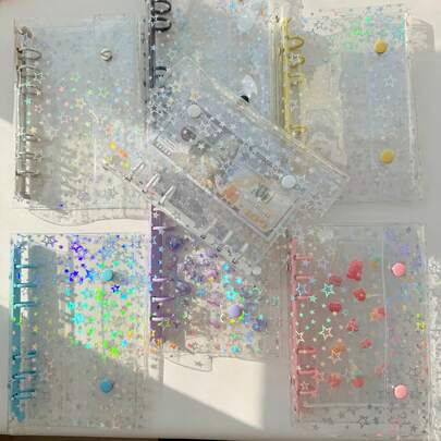 สมุดใส่สติกเกอร์ใสขนาด A6 ลายดาวกลิตเตอร์แบบพกพา, สมุดใส่สติกเกอร์ใส, สมุดสติกเกอร์, ไส้แฟ้มใส, แผ่นรองปั๊ม, การ์ดสติกเกอร์หยดลูกกวาด, ตราประทับ, ถุงเก็บรูปภาพ, อัลบั้มรูปภาพ, แพลนเนอร์งบประมาณ, ไดอารี่, สมุดโน้ต, เครื่องใช้สำนักงาน