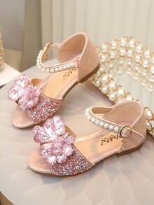 一双儿童凉鞋，饰有水钻、珍珠和蝴蝶结，采用Gilly PU拼接圆头设计，平底，适合日常穿着、舞蹈、户外活动、节日庆典和派对，闪亮公主风凉鞋，适合春、夏、秋季穿着。 - 粉色 - 查看 6